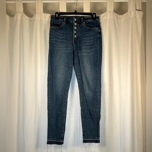 LOFT curvy skinny button front jeans with raw hem